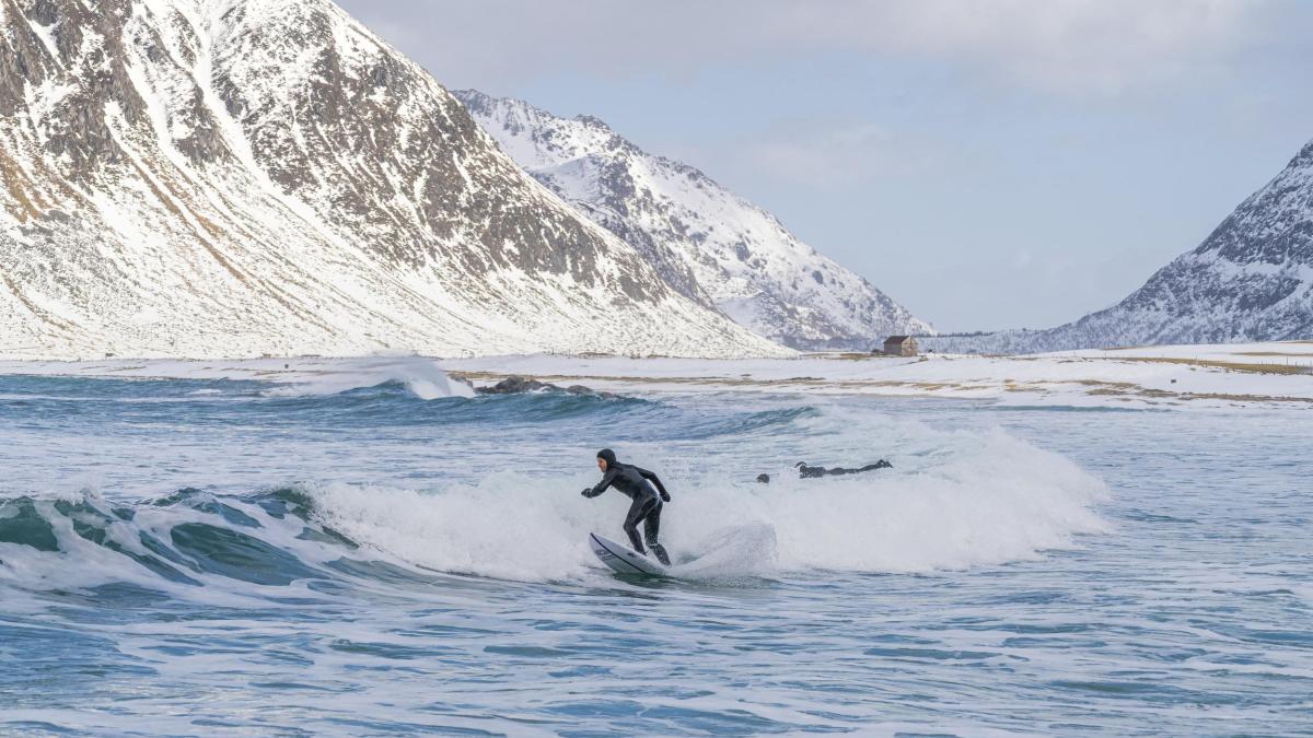 Winter surfing at Skagsanden beach Lofoten Norway.jpg