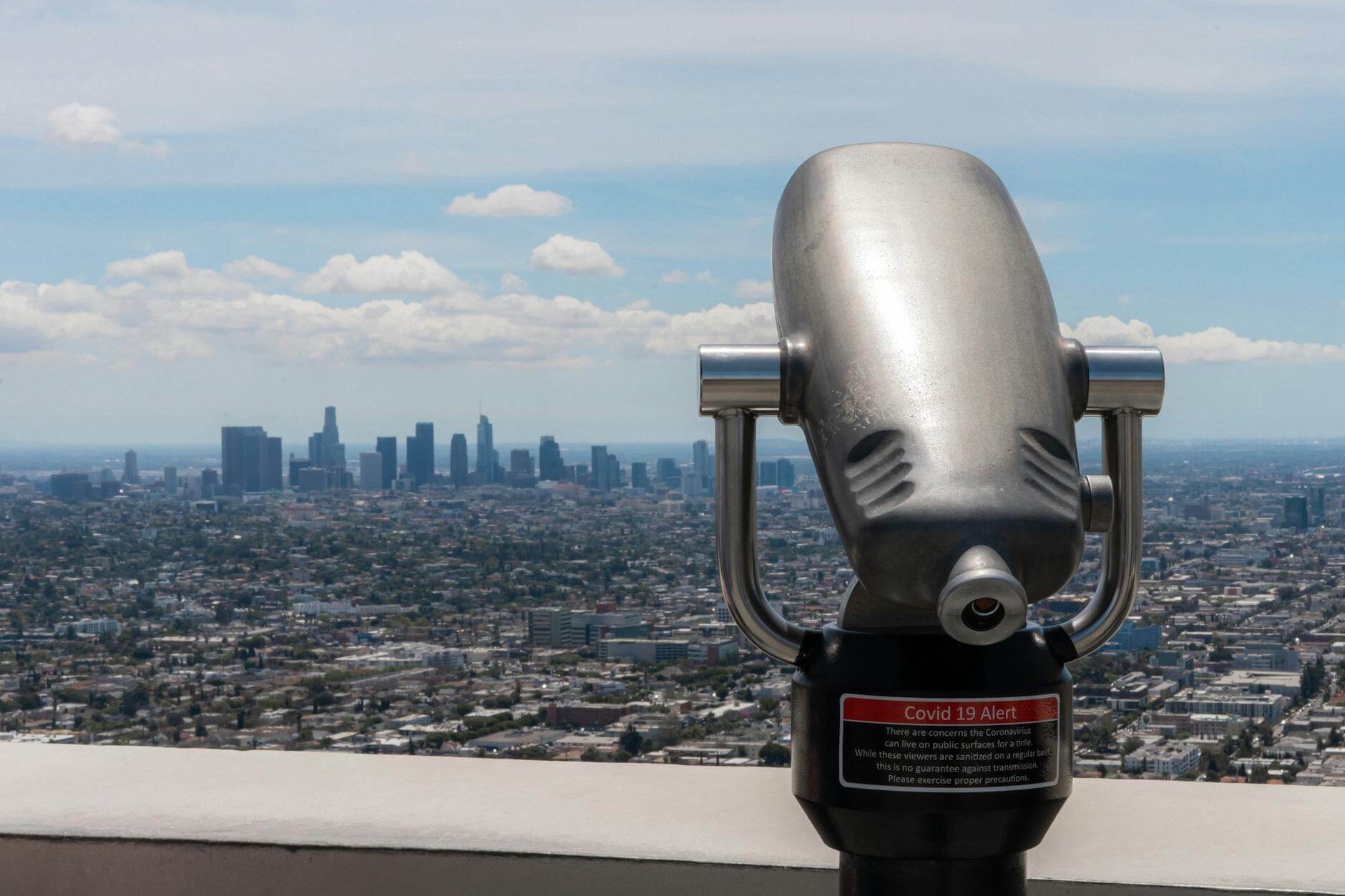 Best things to do in Los Angeles – tours, attractions & experiences - a binoculars looking out over a city
