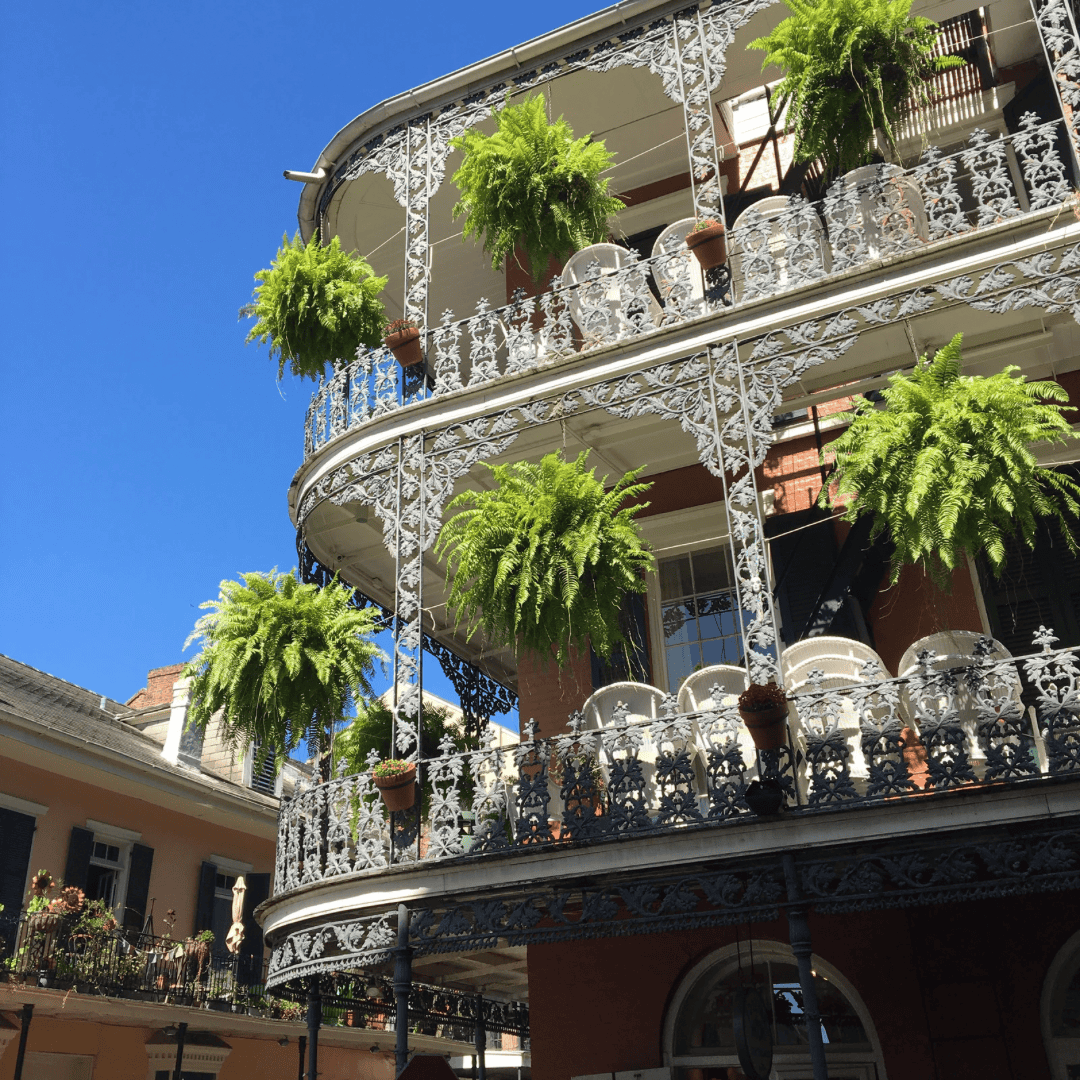 A classic architectural detail of the French Quarter, showcasing the unique Spanish and French influence on New Orleans' historic buildings.