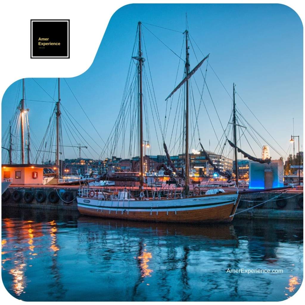 Historic sailing ship reflected in the water at Oslo Harbour